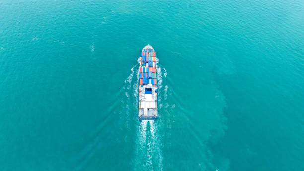 istock Cargo container ship carrying container and running in the ocean near international container port customs shipyard sea port concept smart logistic service. transportation logistics trading. 2161425914