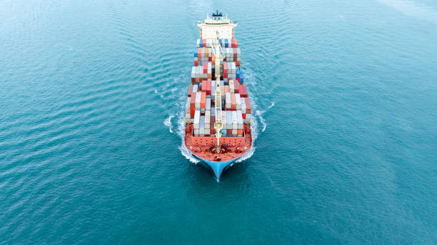 istock Cargo container ship carrying container and running in the ocean near international container port customs shipyard sea port concept smart logistic service. transportation logistics trading. 2161425947