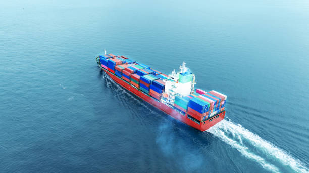 istock Cargo container ship carrying container and running in the ocean near international container port customs shipyard sea port concept smart logistic service. transportation logistics trading. 2161425981