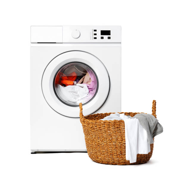 istock White Washing Machine With Laundry Basket on Top 2161428127