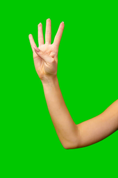 istock Woman Holding Out Hand on Green Screen 2161428292