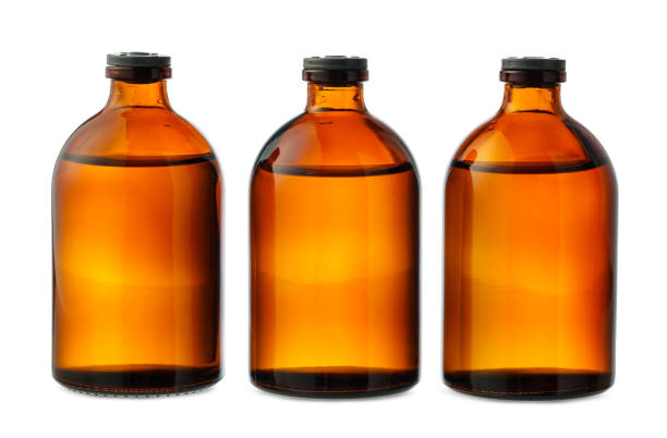 A photo showcasing three amber glass bottles, each filled with a translucent liquid.