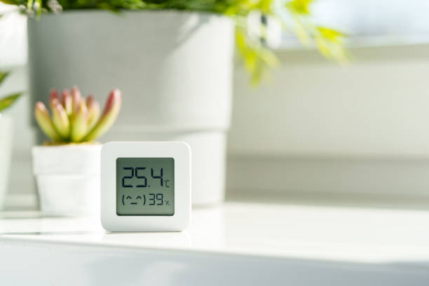 istock White Digital Thermometer Displaying Room Temperature and Humidity 2161432657