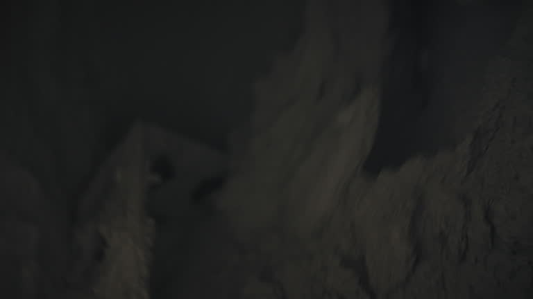 Mixing concrete mortar in a concrete mixer