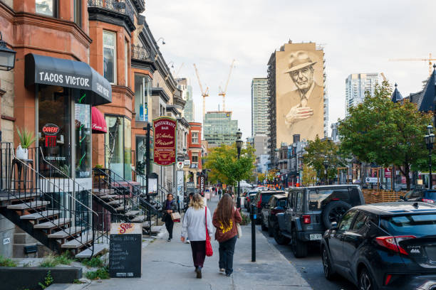 Montreal, Quebec, Canada - October 16 2022 : People walking on Crescent Street, a popular attraction for both tourists and locals.