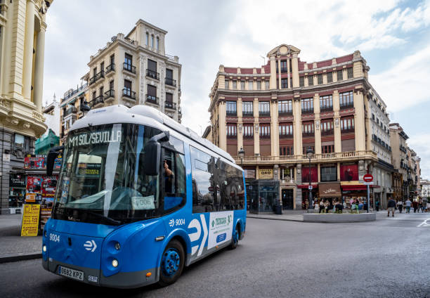 Madrid, Spain. 29 June 2024. Small bus transport on the streets of downtown Madrid.