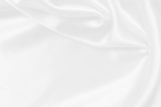 istock White fabric texture background, detail of silk or linen pattern. 2161440790