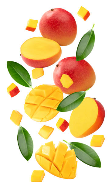 istock flying mango with slices and green leaves isolated on white background. clipping path 2161441989