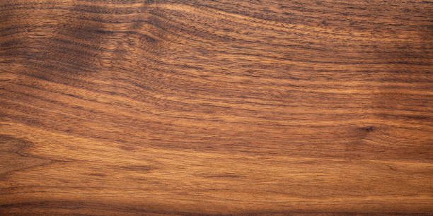 istock Walnut wood texture. Super long walnut planks texture background.Texture element. wood texture background. 2161444194