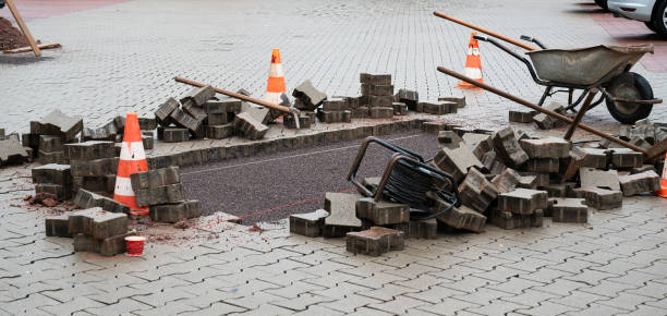 Repairing the sidewalk or parking lot, emergency service for broken pavement, construction site