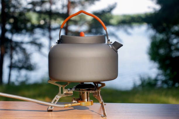 istock A tea kettle is resting on a gas burner on a tabletop 2161447824