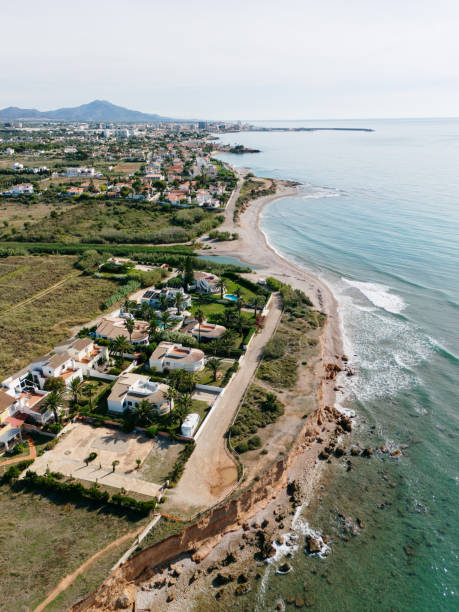 istock Coast with houses 2161448159