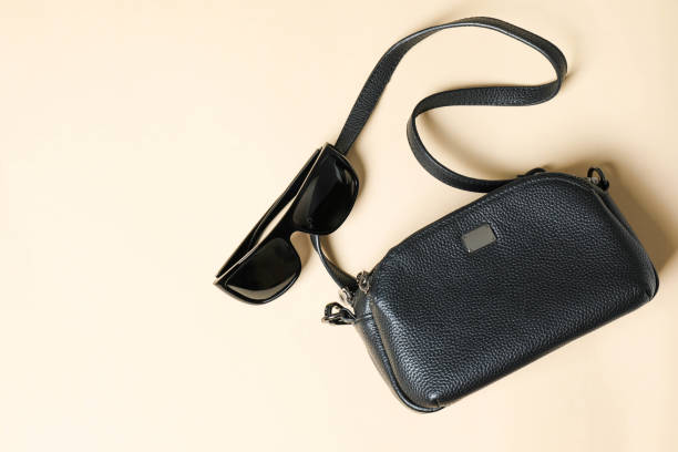 istock crossbody handbag with sunglasses 2161452086