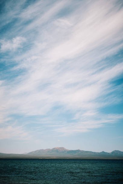 Clouds over highland freshwater lake (3100 meters high). Song-Kul Lake, Kyrgyzstan
