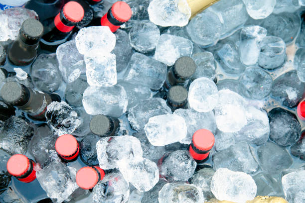 istock Cold bottles of beer in ice cubes 2161456171