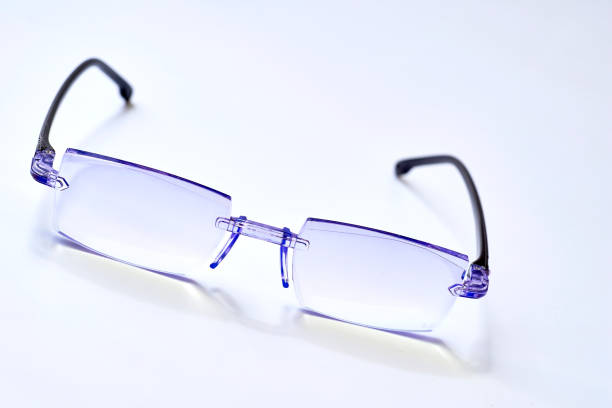 istock Glasses to improve vision on gray 2161458904
