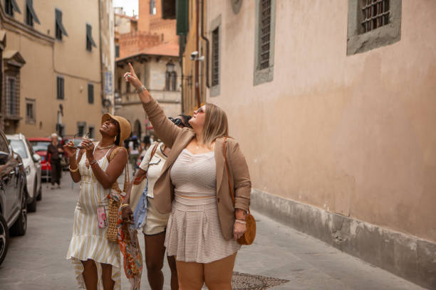istock Three female friends on a weekend sightseeing trip in Pisa 2161460373