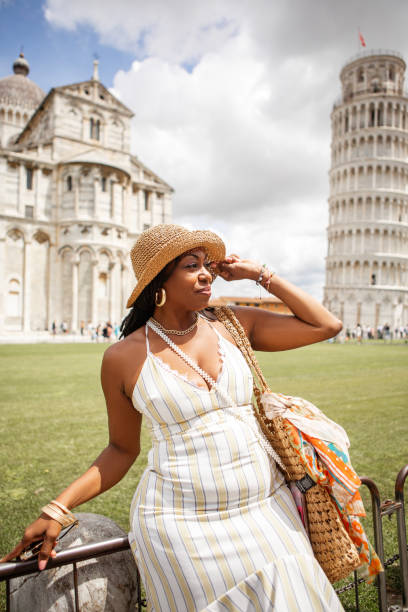 istock Single black senior woman on a weekend sightseeing trip in Pisa 2161461021