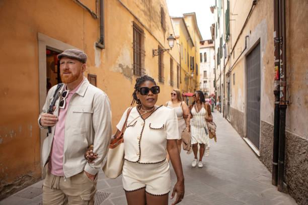 istock Four friends on a senior weekend sightseeing trip in Pisa 2161461282