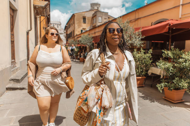 istock Two female friends sightseeing in Pisa 2161461301