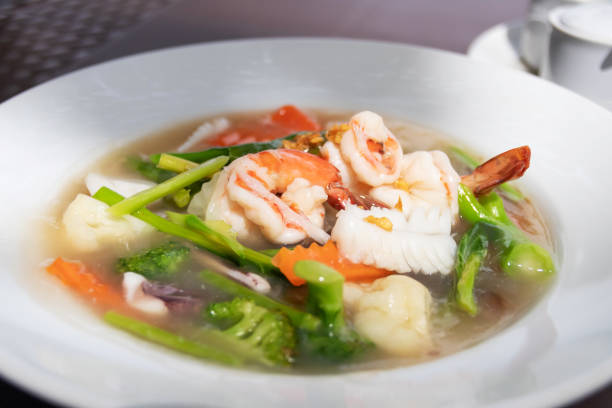 istock Gravy seafood with kale and carrot sauce served with fried noodles (Rad-Na Ta-lay). 2161462607