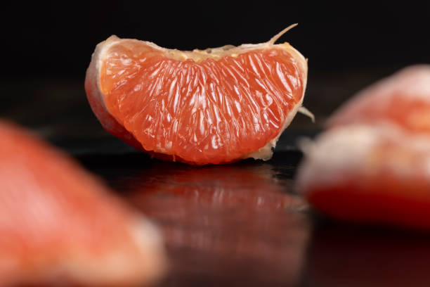 istock slices of peeled grapefruit close-up 2161464089