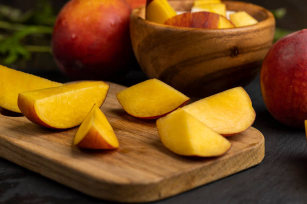 istock yogurt and cow's milk and nectarine slices 2161464109