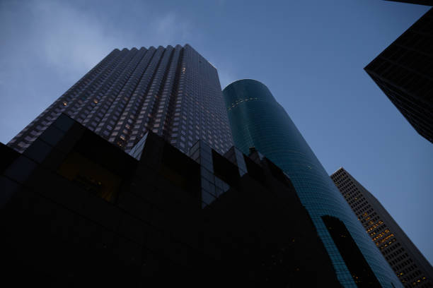 A siloutte of an office buidling against skyscrapers in Heritage Plaza Texas Houston
