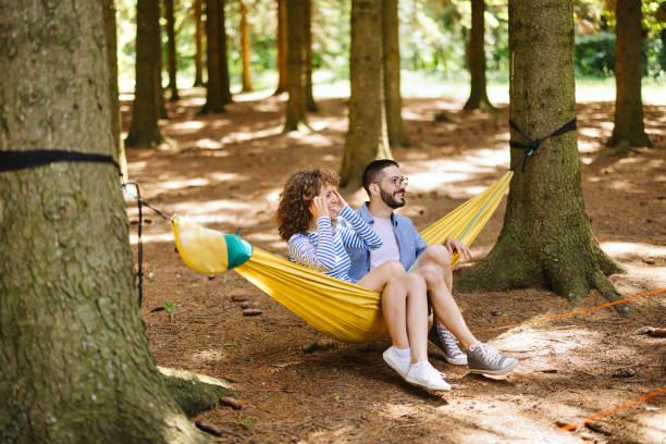 istock Beautiful couple relaxing in the hammock 2161471843