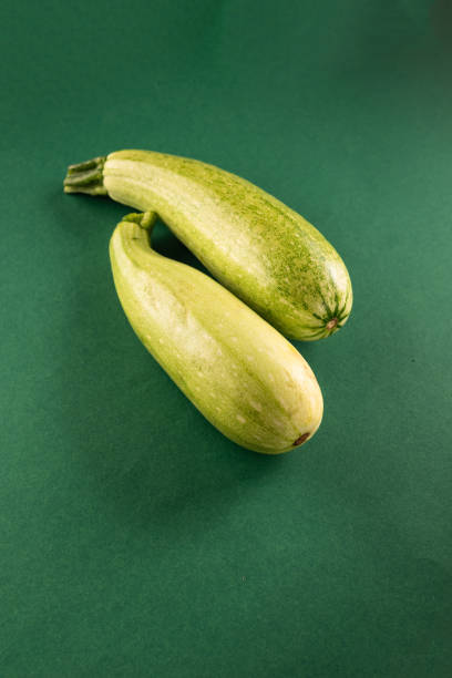 Fresh young zucchini on Dark Table - Summer Harvest