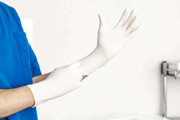 istock Medical Professional Wearing Sterile Gloves 2161475209