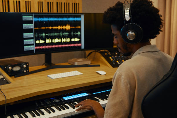 istock Composer Playing Piano And Recording New Song 2161477797