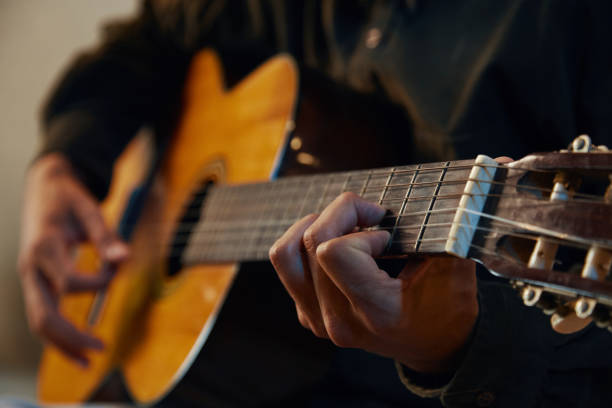 istock Guitarist Playing Guitar In Studio 2161478477