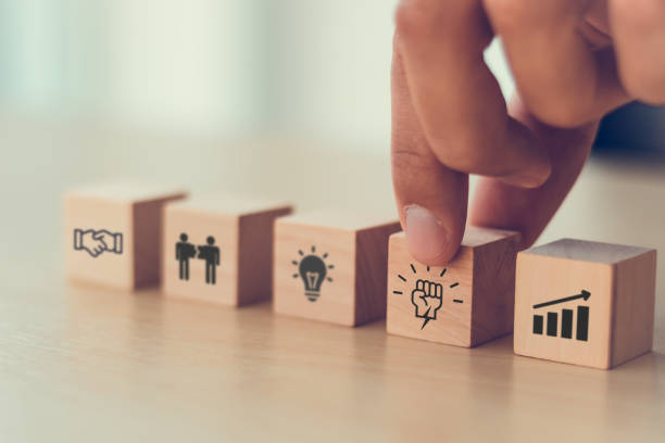 istock Collaboration, empowerment, support and solidarity concept. Giving team members authority. Ways to foster employee empowerment; goal, growth, moral, power, learning, access and positive thinking. 2161478554