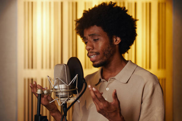 istock Vocalist Recording Song In Studio 2161478991