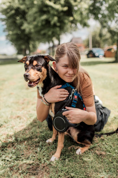 istock Young girl and her puppy 2161480263