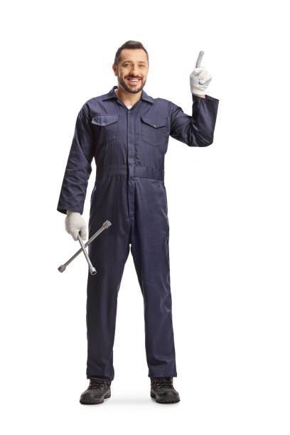istock Car mechanic holding a wrench and pointing up 2161480505