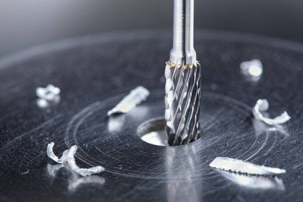 istock Milling cutter make sink in hole in steel billet. Locksmith work. 2161483048