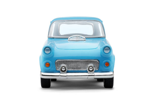Directly Above Shot Of Colorful Toy Cars Over White Background