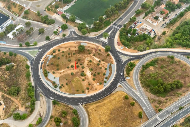 above view of car traffic on crossroad of Avinguda Diagonal in Barcelona city in evening