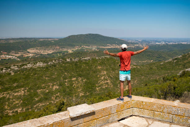 istock Tourist with open arms in natural landscape 2161489256