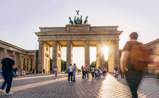 istock Sunset Glow at Brandenburg Gate in Berlin, Tourists Walking 2161490467