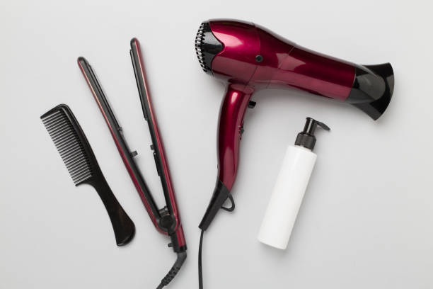 istock Hair tools with thermo protection on color background, top, view 2161493959