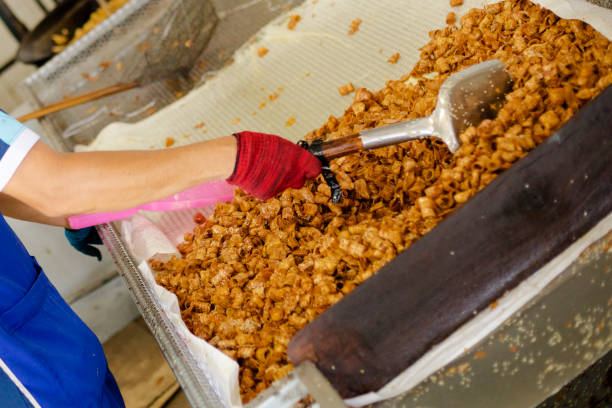 istock Thai worker is Making deep fried banana snack slices 2161495436