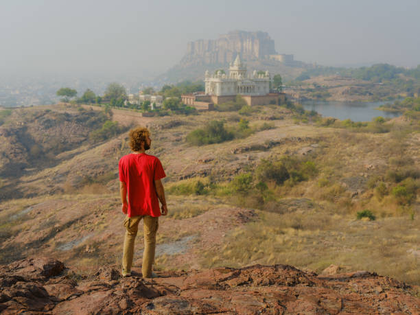 istock Man exploring Jodhpur fort and desert at sunset 2161498377
