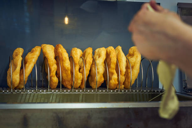 Langos, a typical Hungarian food. Deep fried flatbread in oil.