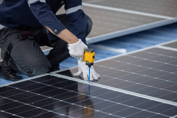 istock Engineer repair solar panel on the factory rooftop 2161502661