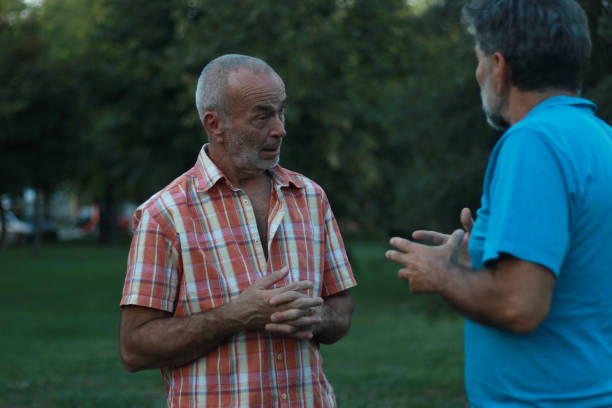 istock Two mature men talking about work in nature 2161504665