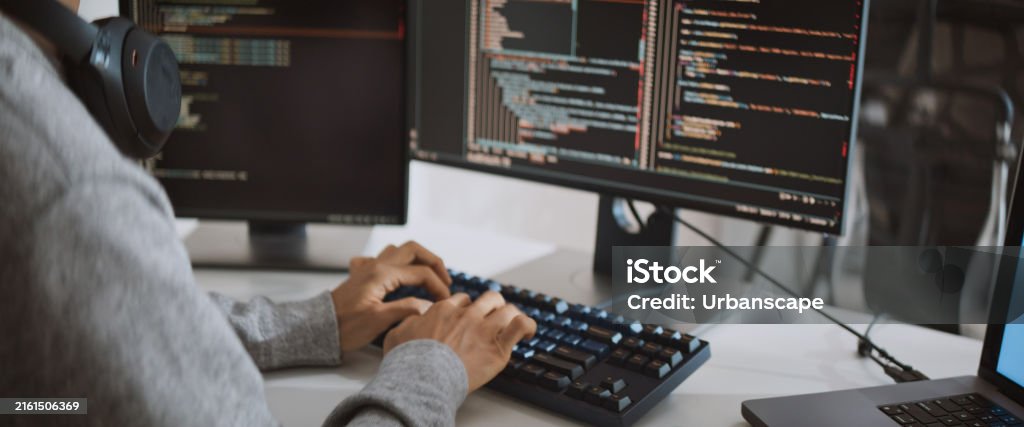 Young Adult Asian Male Software Developer Coding Program On Desktop ...