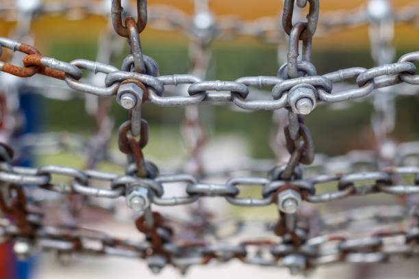 a metal chain connected by a screw and nut